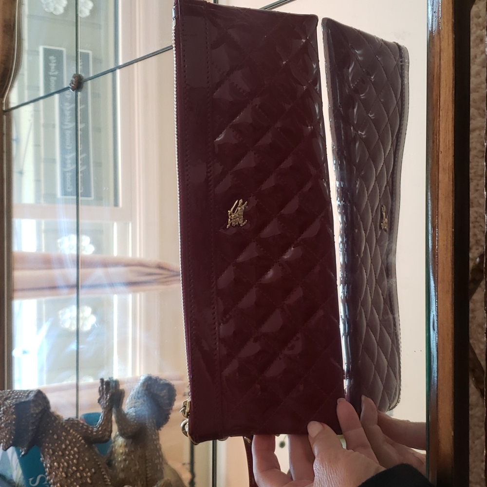 Authentic Burberry hand clutch see pics for details